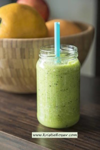 green smoothie with blue straw