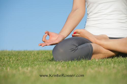 shutterstock_yoga woman grass